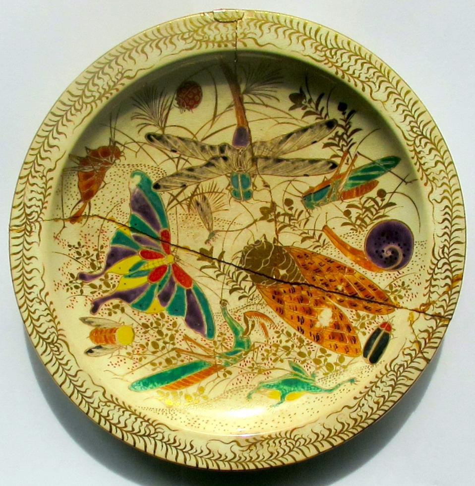 20th-century plate with insects etc
